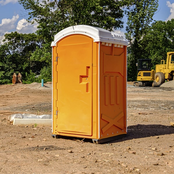 how often are the porta potties cleaned and serviced during a rental period in Wauna